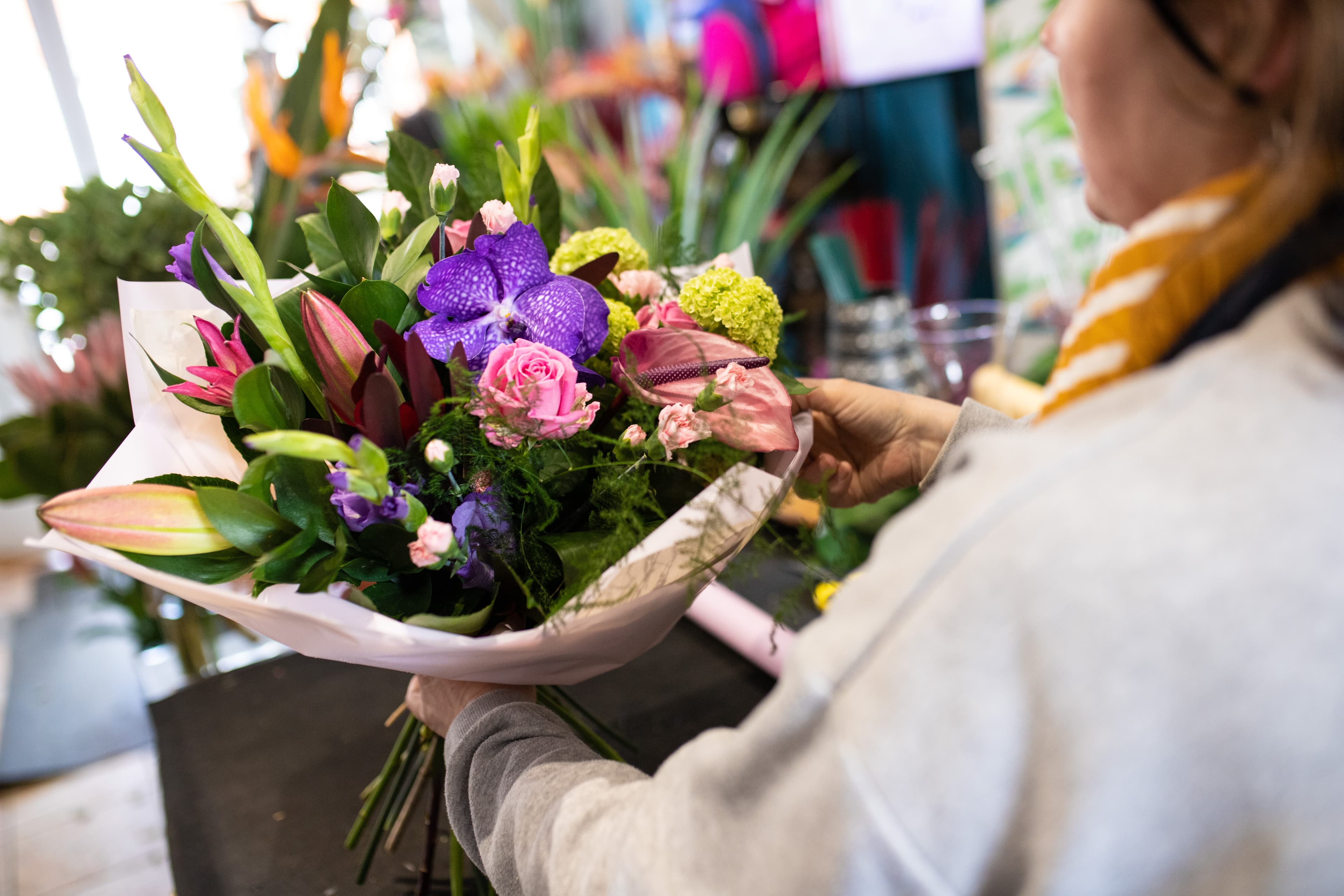 Florist preparing a composition